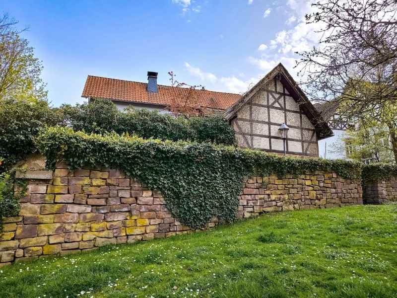Property Line Survey Retaining Wall Slope San Antonio Texas | San Antonio Land Surveying Property line survey for a retaining wall following a residential slope in San Antonio Texas